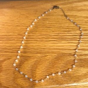 brandy melville gold necklace with white beads